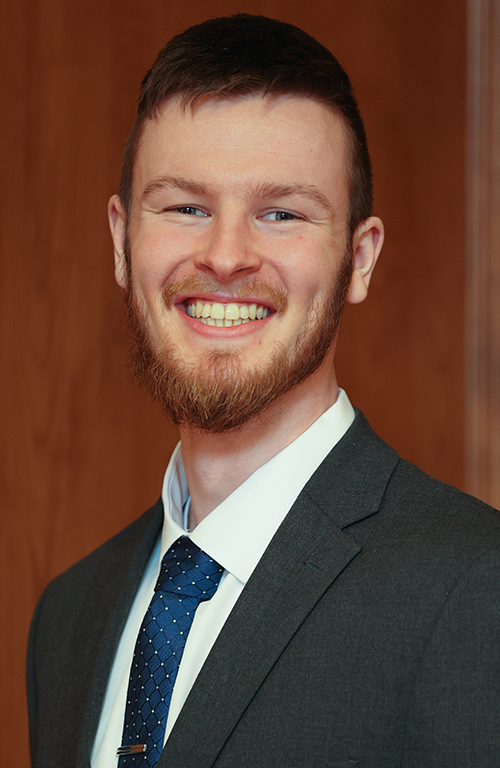 Extern Levi Keys smiles in his headshot.